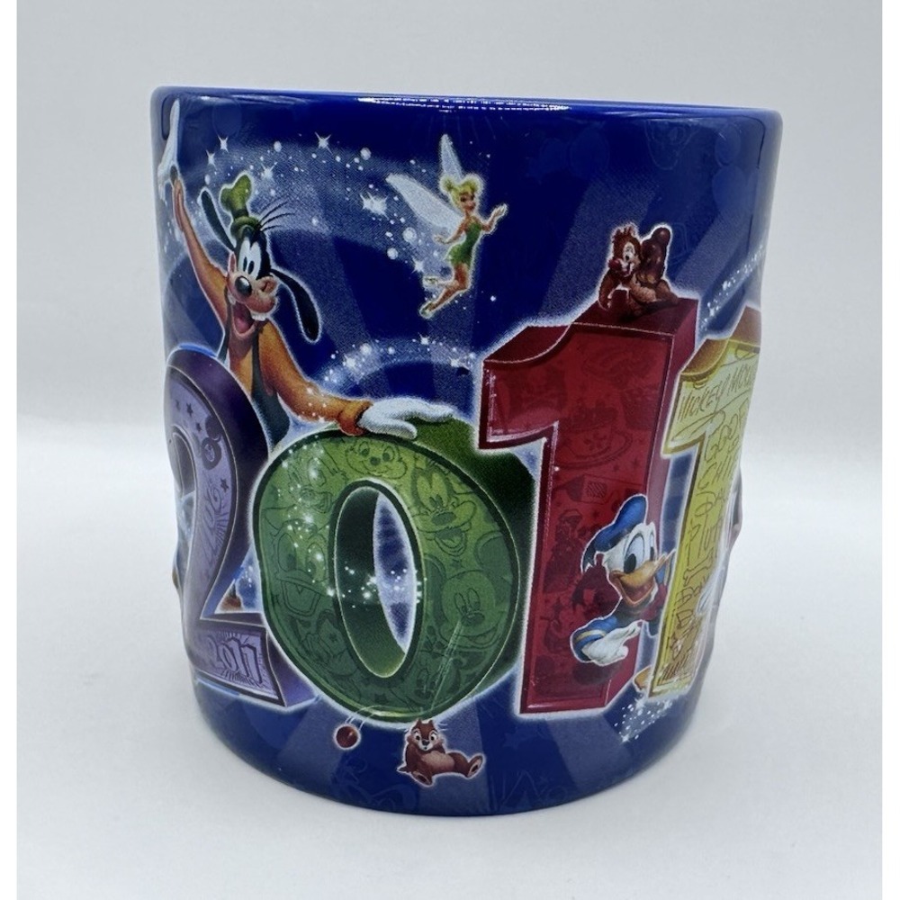 Disney Parks 2011 Blue Ceramic Coffee Mug Mickey Mouse Goofy Donald Duck